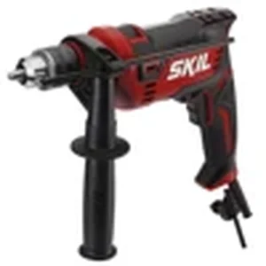 SKIL corded hammer drill used for drilling into concrete