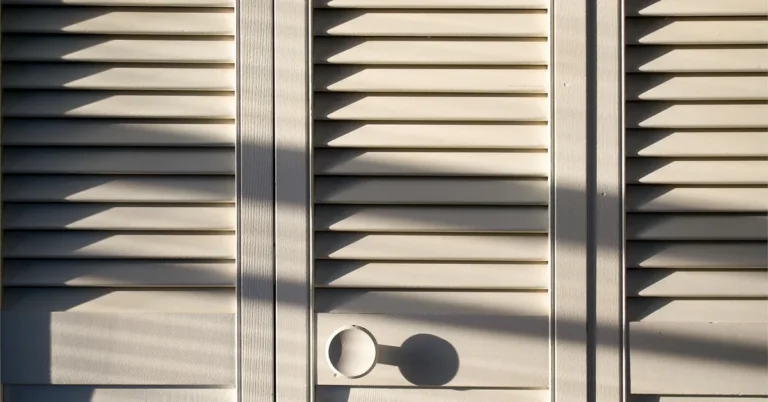 Modern white sliding closet door with a wood grain handle