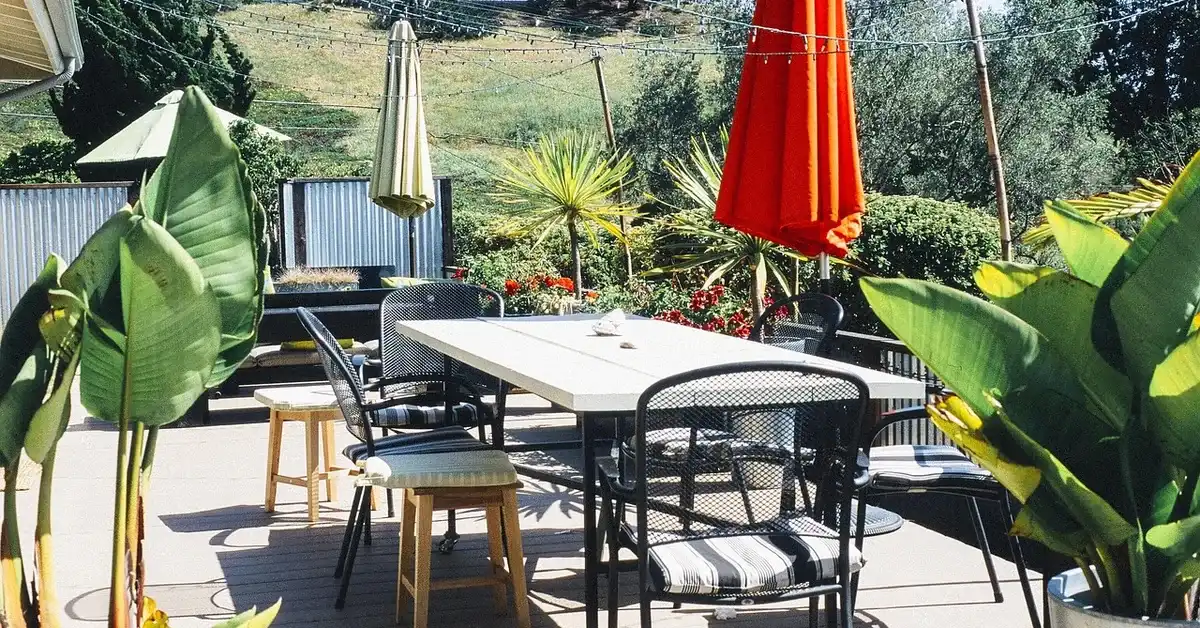 String lights hung across a covered patio and porch