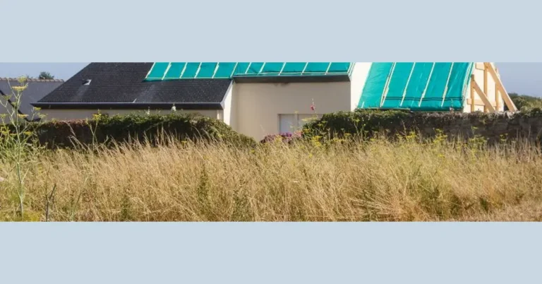 green tarp attached to the side of a house