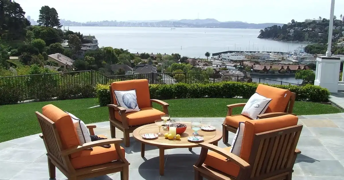 Teak patio furniture set finished with protective oil