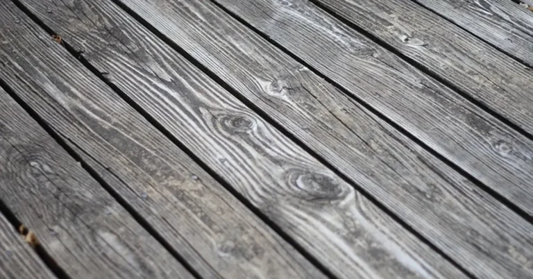 Weathered pressure treated deck boards before sealing