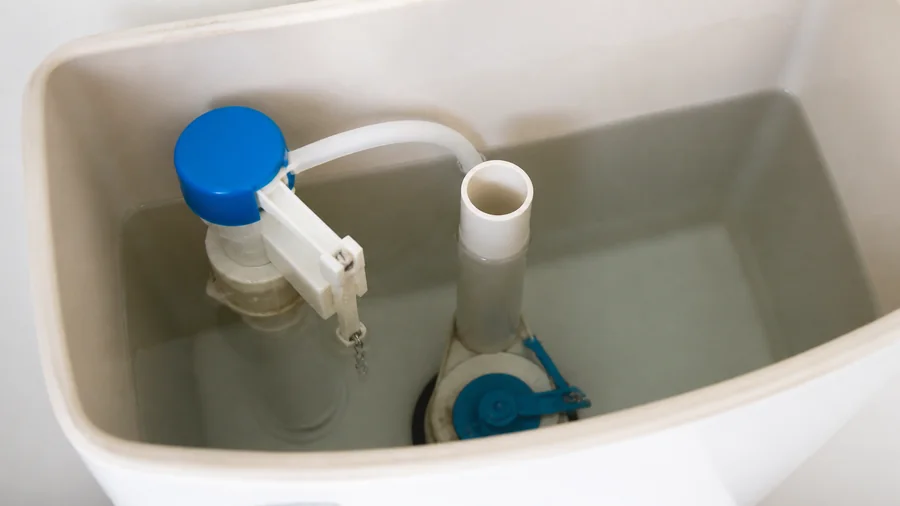 Toilet tank water level and flush components inspected for a weak or incomplete flush