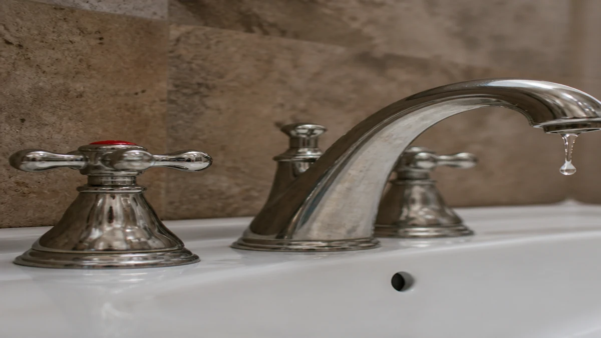 Hot water faucet and under-sink hot supply connection checked for a leak