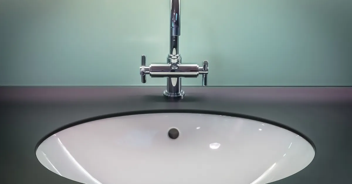A single-handle bathroom faucet at a sink.