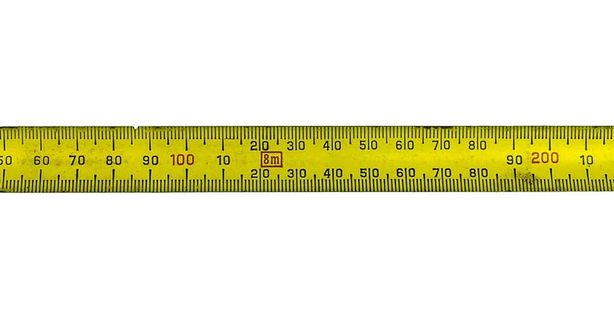 Tape measure extended with the hook end visible