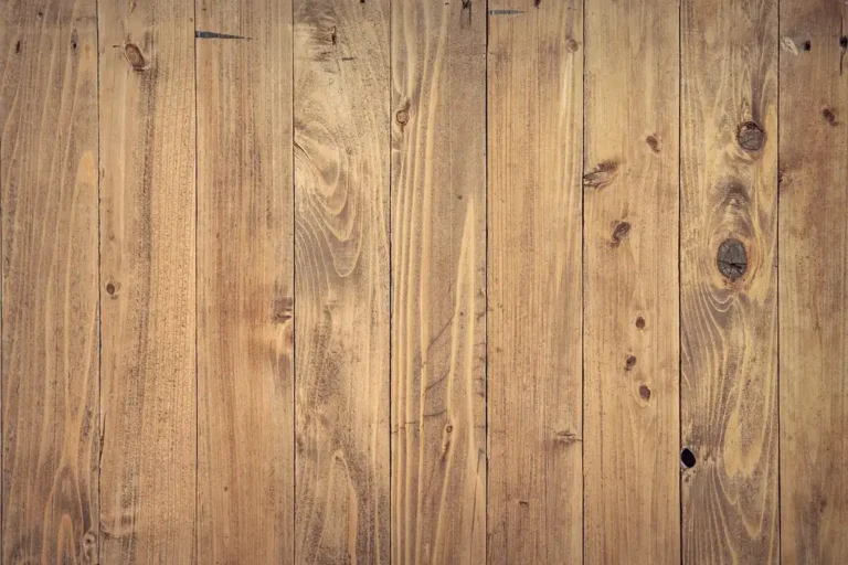 Microfiber flat mop on a light oak hardwood floor in natural window light