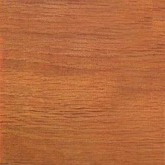 Close-up of a chisel and saw trimming the layered edge of plywood for a dovetail joint