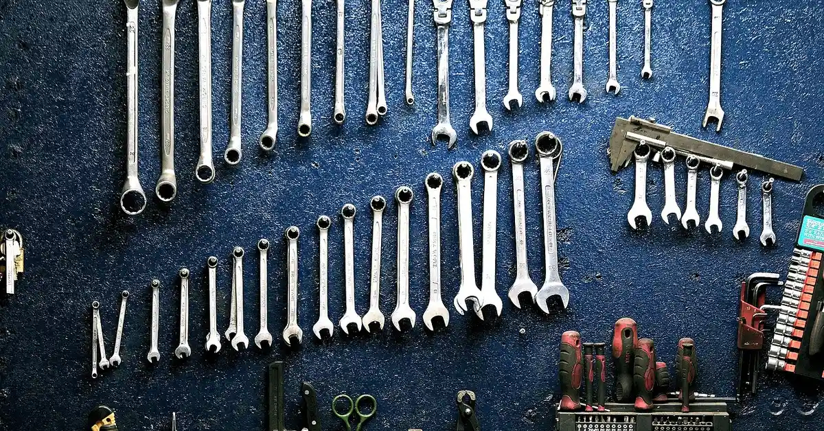 Hand tools neatly arranged in a workshop tool organizer