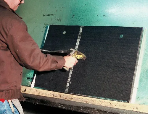 A close-up shows a pilot hole being drilled into wood before driving a screw.