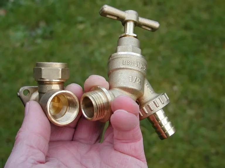 Homeowner diagnosing a dripping bathroom faucet beside tools and replacement parts