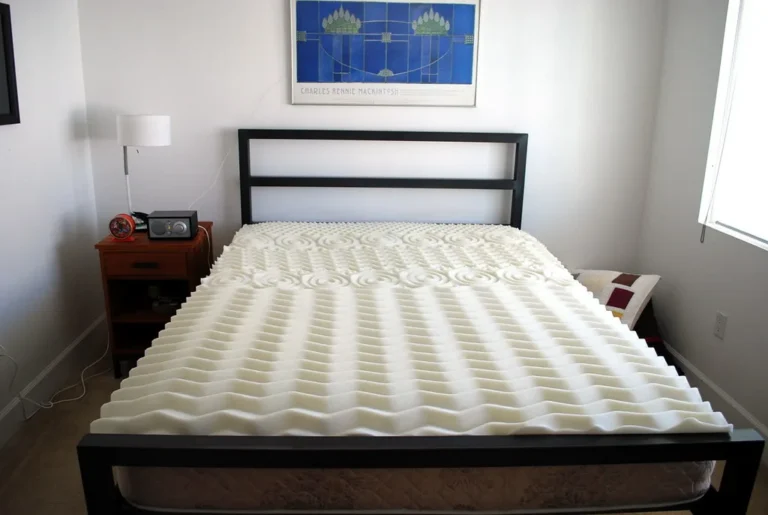 Couple resting on a memory foam mattress in natural morning light