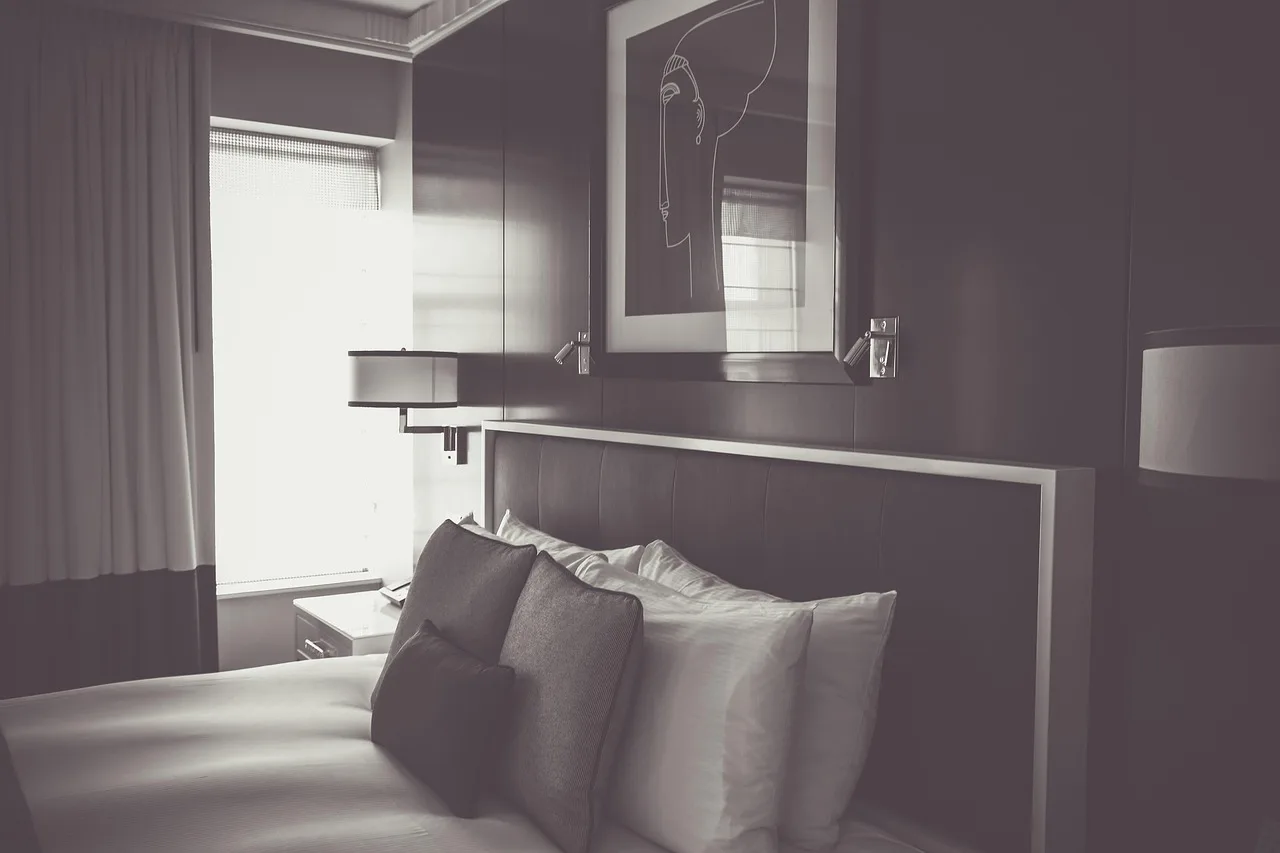 Lighting fixtures guide scene with a flush mount, pendant, and floor lamp in a modern living room