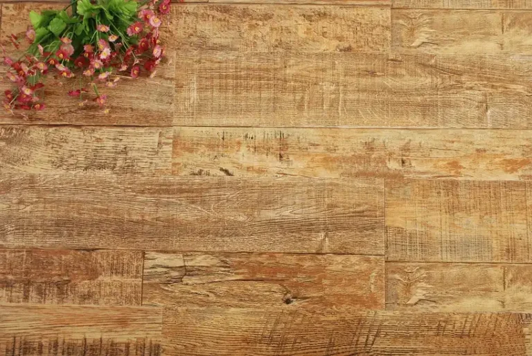 Pink flowers on a rustic wooden plank surface