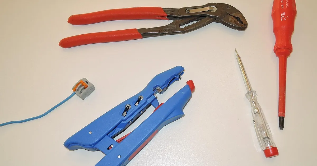 A voltage tester tool used to check for live electrical current.