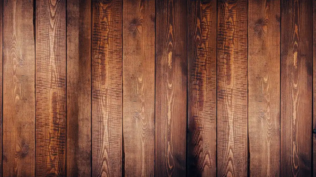 Woodworker comparing hardwood, plywood, and MDF samples on a bright workbench